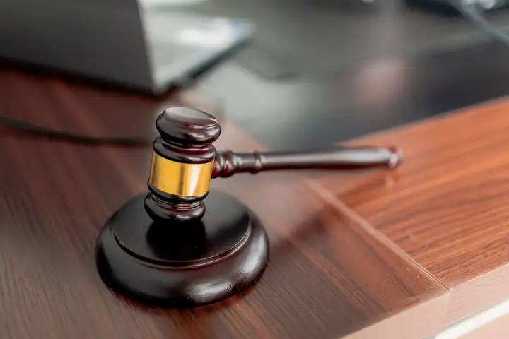 A gavel on a desk in the firm's Moncton office