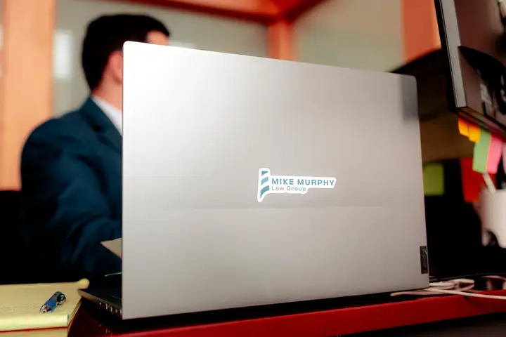 A laptop carrying the firm's logo in the Moncton office